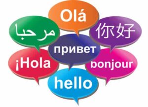 Seven colorful speech bubbles each display hello in different languages—including English, Spanish, French, Russian, Arabic, Chinese, and Portuguese—on a white background, bringing an international flair reminiscent of Curacao's vibrant culture.